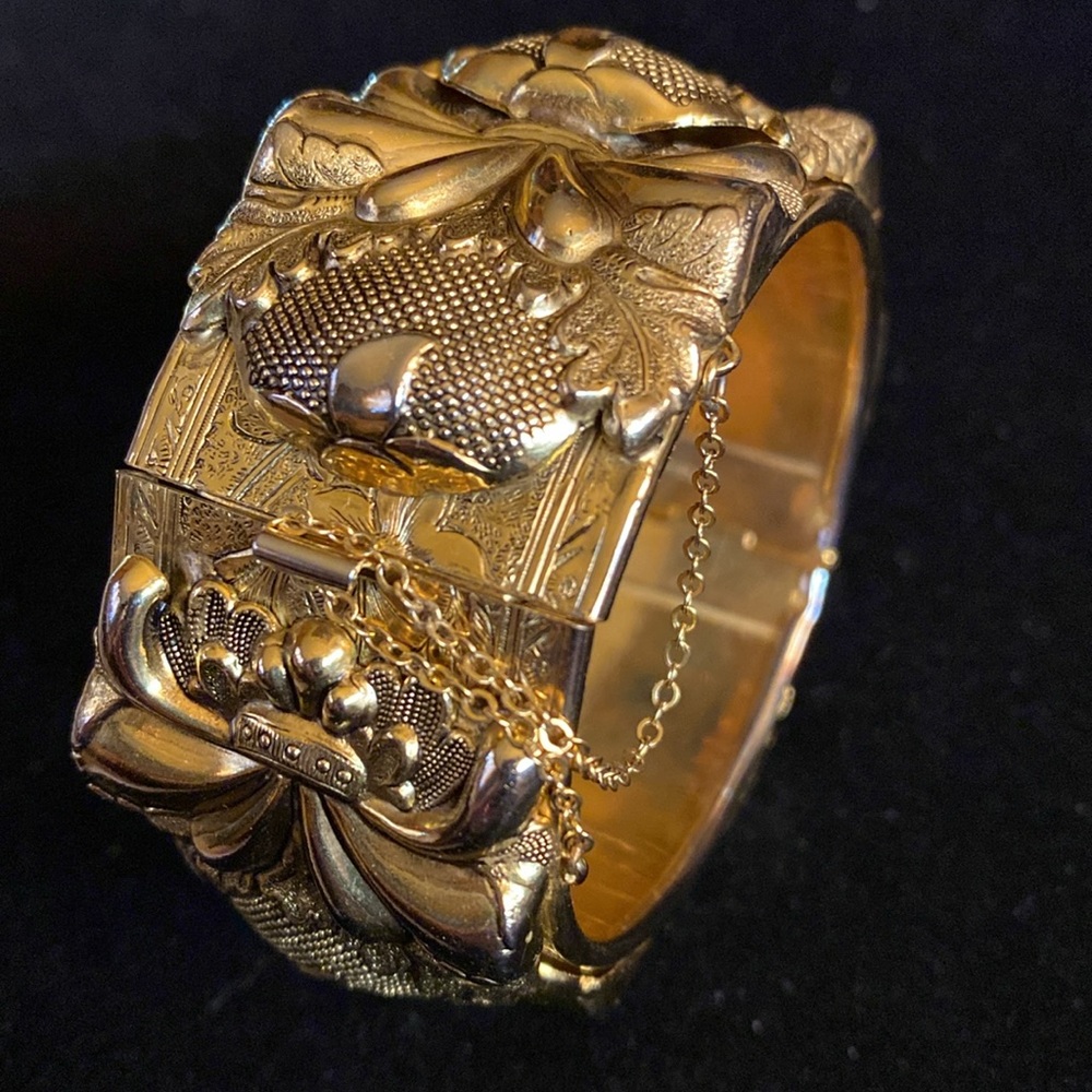Vintage Vargus hinged Bracelet.Raised Scrolled design. Excellent condition!